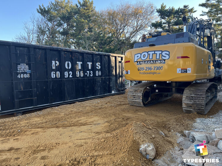 Excavator and dumpster branding graphics